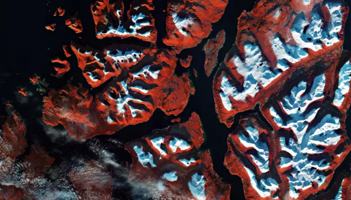 Infraraudt bilete av Tromsø, kor kunstig fargelegging gjer all vegetasjon raud. Frå satellitten Sentinel-2. Med ESA sine satellittar kan me danne oss eit globalt bilete av faktorane som påverkar klimaet vårt, til dømes temperatur, vegetasjon, vasskvalitet og -kvantitet, skriv Andrea Marinoni.