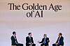 Fire paneldeltakere sitter på en scene under overskriften «The Golden Age of AI».