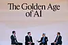 Fire paneldeltakere sitter på en scene under overskriften «The Golden Age of AI».